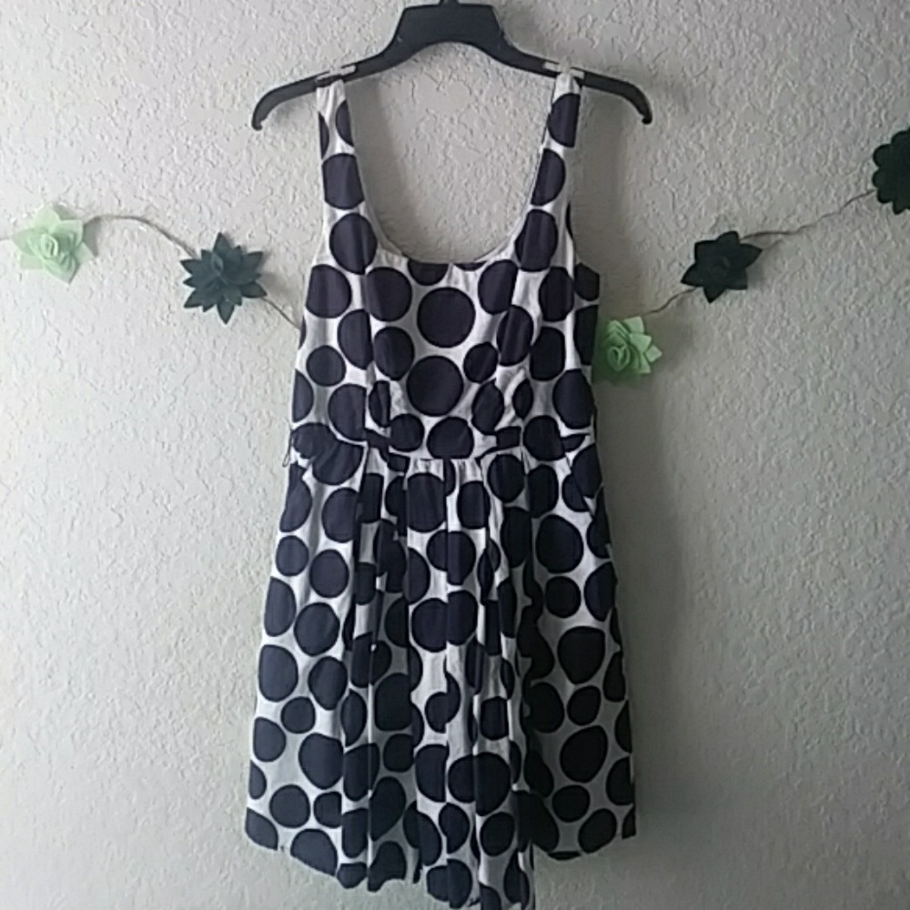 A blue and white polka dot dress